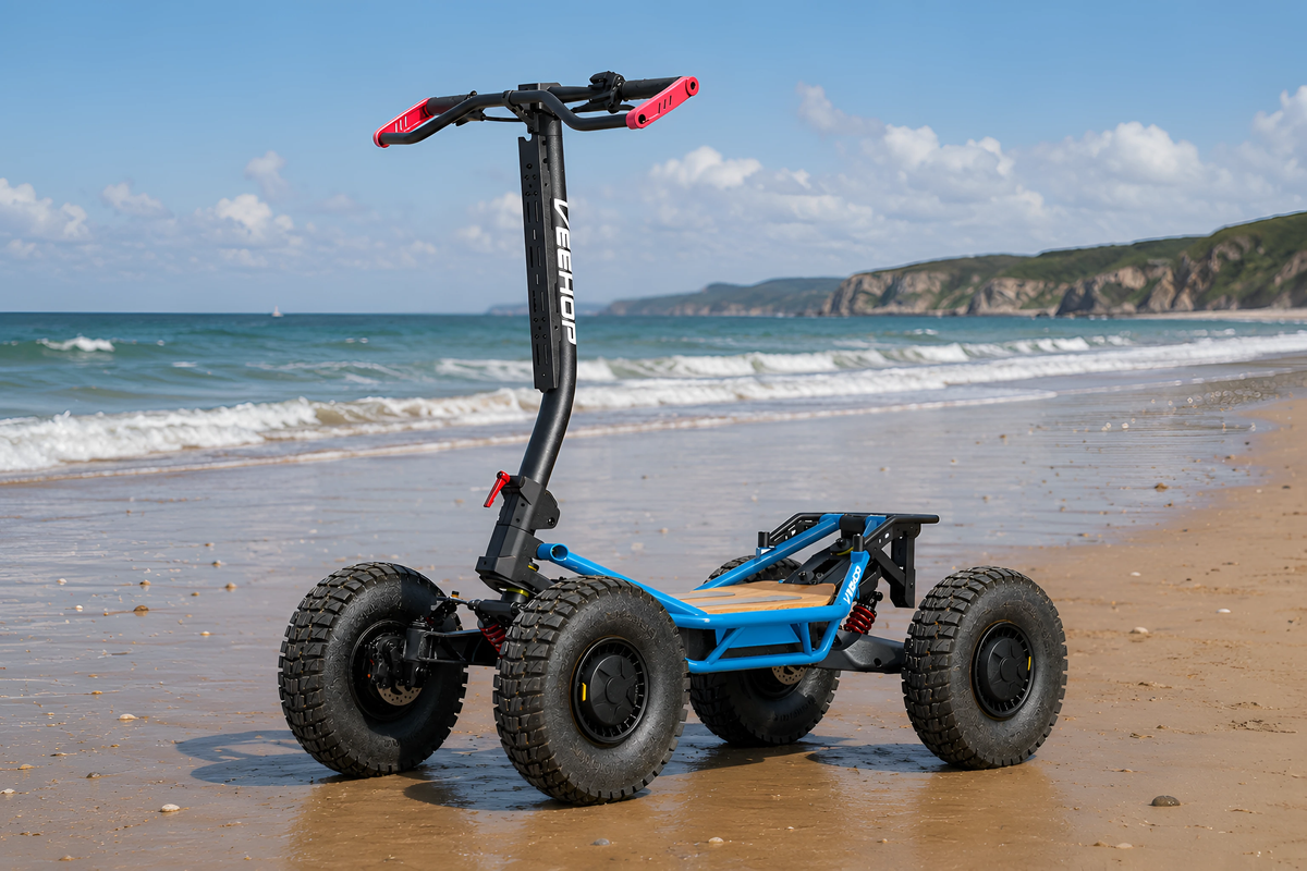 Blue VEEHOP 2WD/4WD electric scooter parked on a beach with cliffs in background
